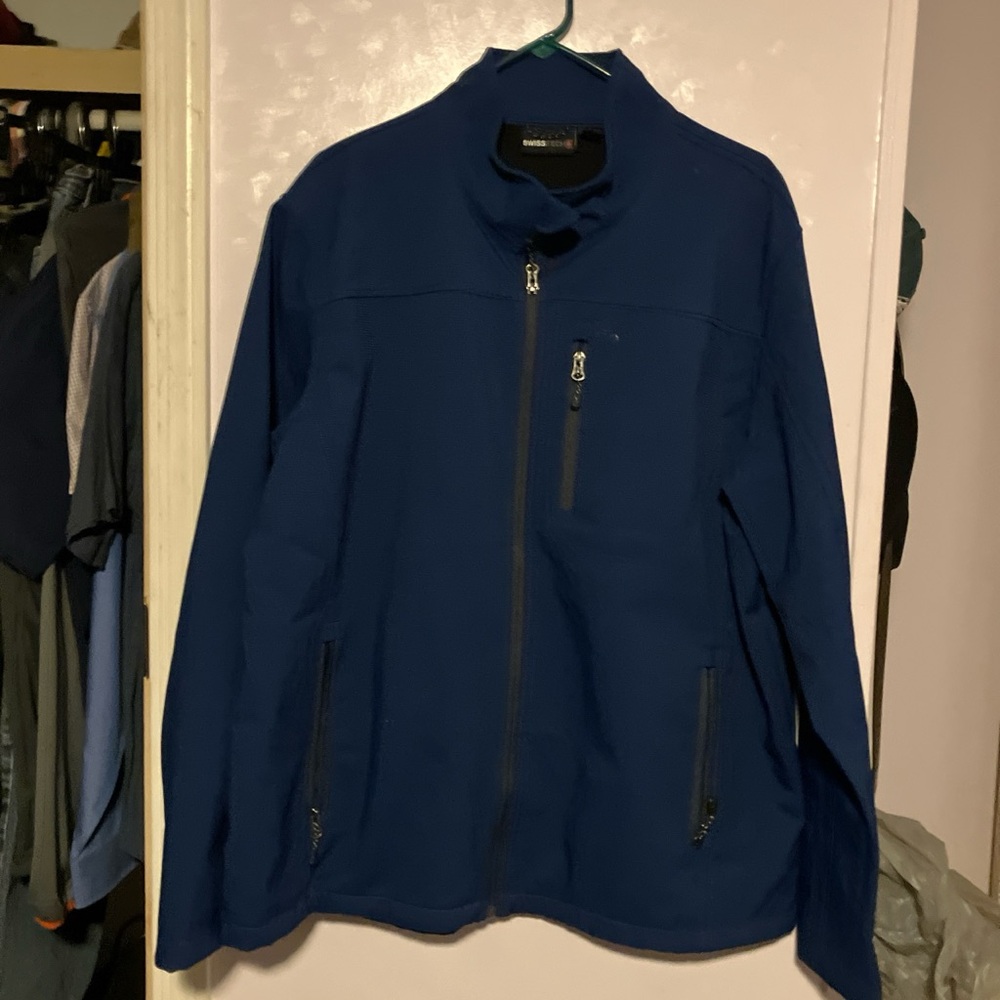 Swiss tech lightweight jacket , full zip and zip pocket, no hood , size XL ,blue